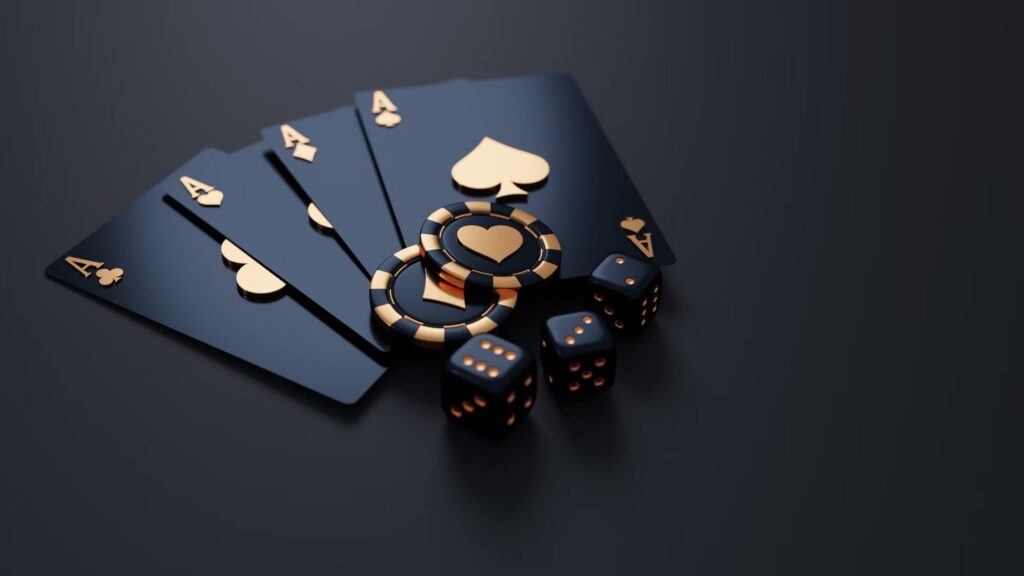 A few colored poker chips and dice on a sleek black background, showing a game of play