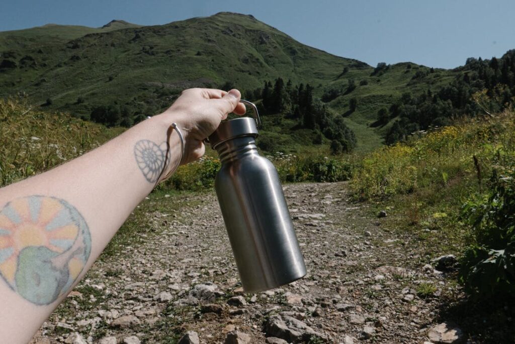 Portable water purification bottle